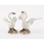 A pair of Meissen of swans, after Johann Joachim Kändler