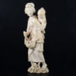 A Japanese carved ivory okimono, Meiji