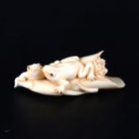 A Japanese carved ivory group, probably early 20th Century