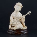 A Japanese carved ivory okimono, Meiji