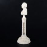 An English carved and turned ivory desk thermometer