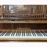 A German rosewood and simulated rosewood cased grand piano