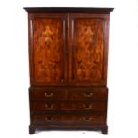 A George III mahogany press cupboard