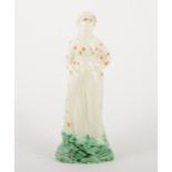 A creamware figure of a lady, late 18th century
