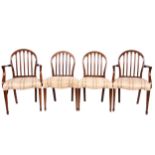 A set of twelve Sheraton inspired mahogany dining chairs, 19th Century and later,