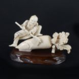 A Japanese carved ivory okimono, probably Meiji