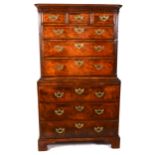 A George III walnut chest on chest