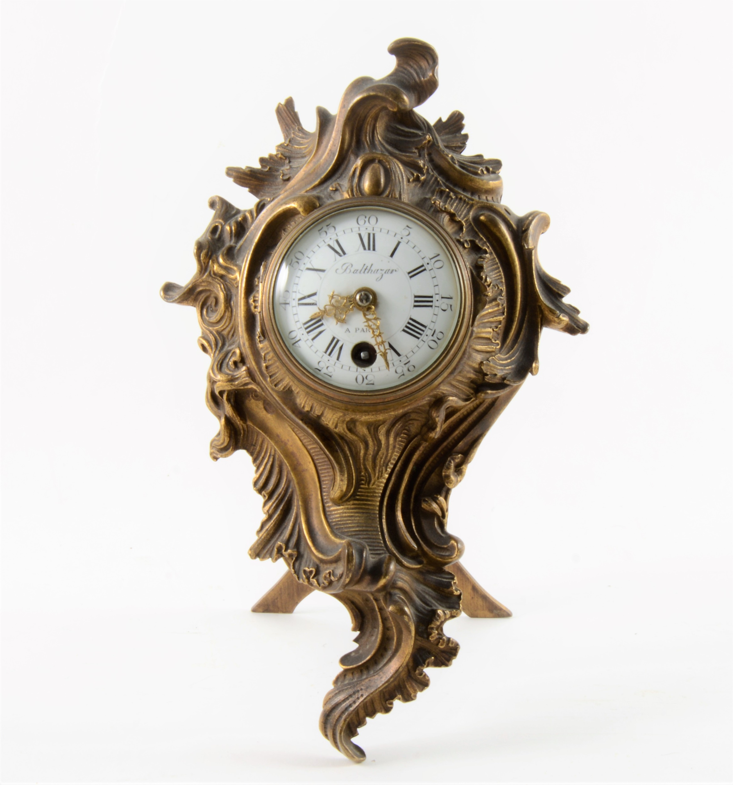 A Rococo style gilt metal strut clock, signed Balthazar à Paris