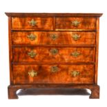 A George II walnut chest of drawers