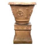 A terracotta garden planter on plinth by Doulton Lambeth