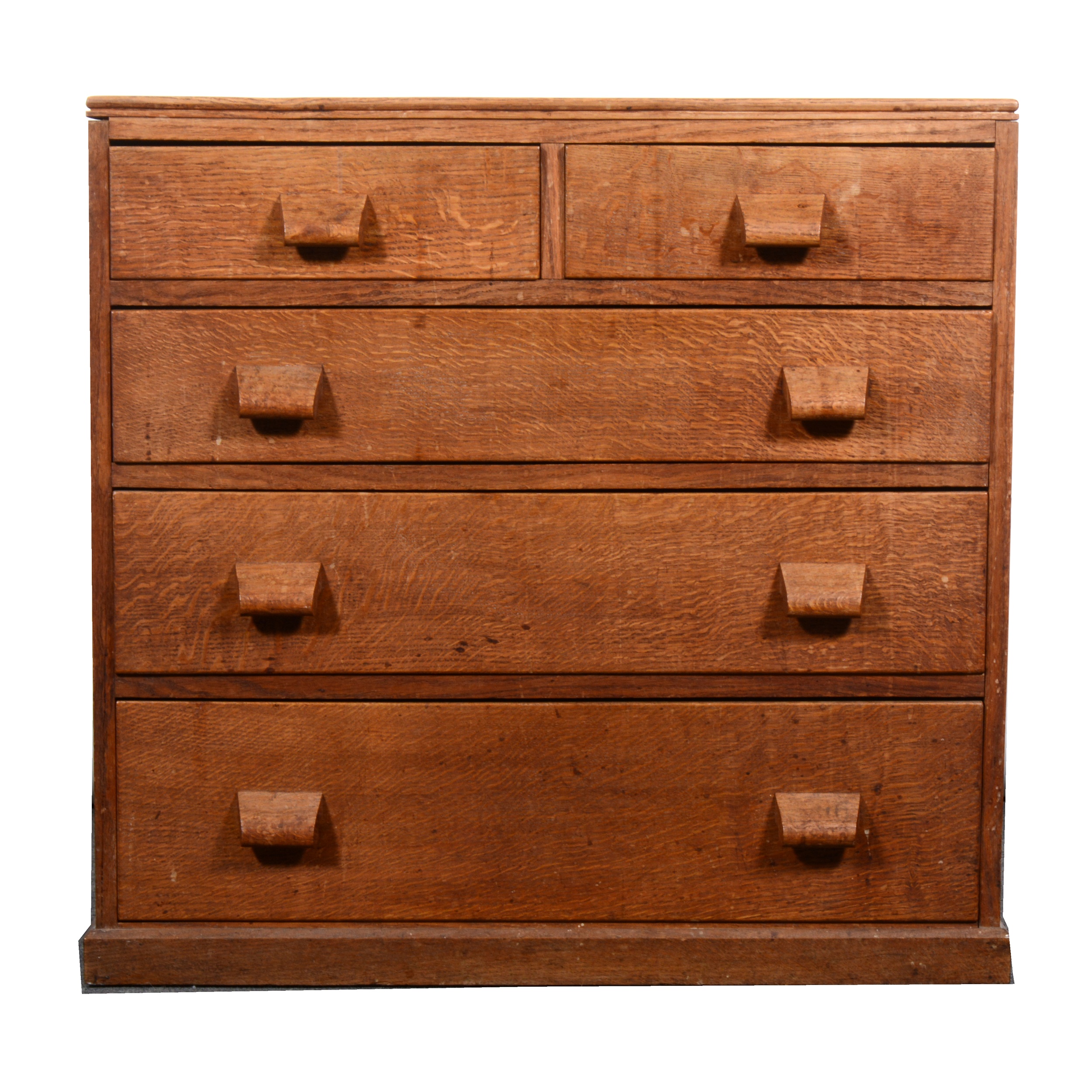 A small Arts and Crafts oak chest of drawers