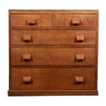 A small Arts and Crafts oak chest of drawers