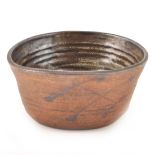 A squeezed stoneware bowl by Janet Leach for the Leach Pottery