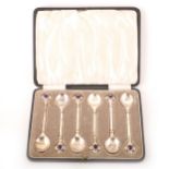 A cased set of six Arts and Crafts silver cabochon set teaspoons, by Harold Edwin Landon of