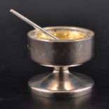 A Modernist silver salt cellar with spoon, Robert Welch, Birmingham and London 1973