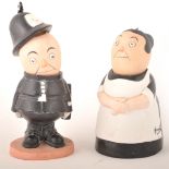 Two comical bisque porcelain figures, designed by John Hassall