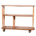 An elm and beech trolley bookcase by Ercol, model 361