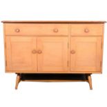 An elm and beech sideboard by Ercol, model 351