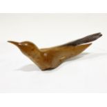 A contemporary craft carved wooden sculpture of a cuckoo, by Jim Brown