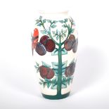 A Moorcroft Pottery vase, 'Plum Tree and Bird' designed by Sally Tuffin