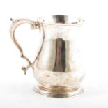 A George II silver baluster shape mug,