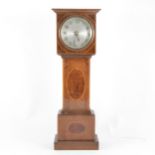 A novelty mantel clock, designed as a mahogany and yew wood longcase