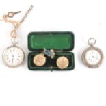 Two white metal open face pocket watches, a silver chain and a pair of gold-plated cufflinks