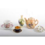 Miniature glass animals, a miniature Mintons cup and saucer and another by Coalport