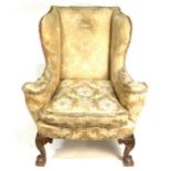 A Georgian style wing-back easychair