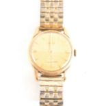 Omega - a gentleman's 9 carat yellow gold wrist watch