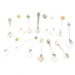A collection of EPNS souvenir crested teaspoons, a couple silver, approximately one hundred and