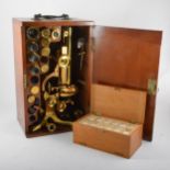 A lacquered brass binocular microscope, J. Swift & Son,