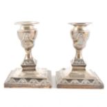 A pair of Victorian silver dwarf candlesticks