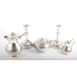 An EPBM four piece teaset, shamrock design, a pair of telescopic candlesticks, plated cutlery, an