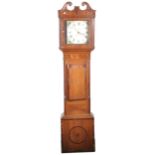 An oak and mahogany longcase clock