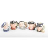 Twelve Royal Doulton character jugs