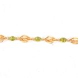 A peridot bracelet marked 15.