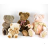 Two boxes of teddy bears and other soft animals