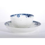 A Caughley blue and white moulded tea bowl and saucer,