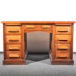 A Lebus type oak twin pedestal office desk,