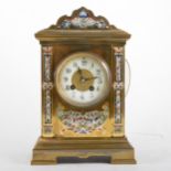 A French lacquered brass and champleve enamel mantel clock,