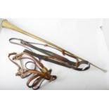 A post/coaching horn in original leather holder, 90cm, a cob-size in hand show bridle and a