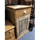 A reclaimed pine pedestal cupboard