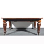 Victorian oak extending dining table