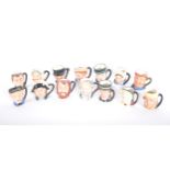 Fourteen Royal Doulton miniature character jugs