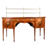 A George III inlaid mahogany bowfront sideboard