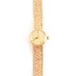 Omega - a lady's 9 carat yellow gold bracelet watch