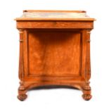 A Victorian satinwood Davenport in the style of Gillows
