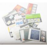 A quantity of loose stamps, presentation sets, an album of First Day Covers.