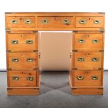 A pine campaign type twin pedestal desk